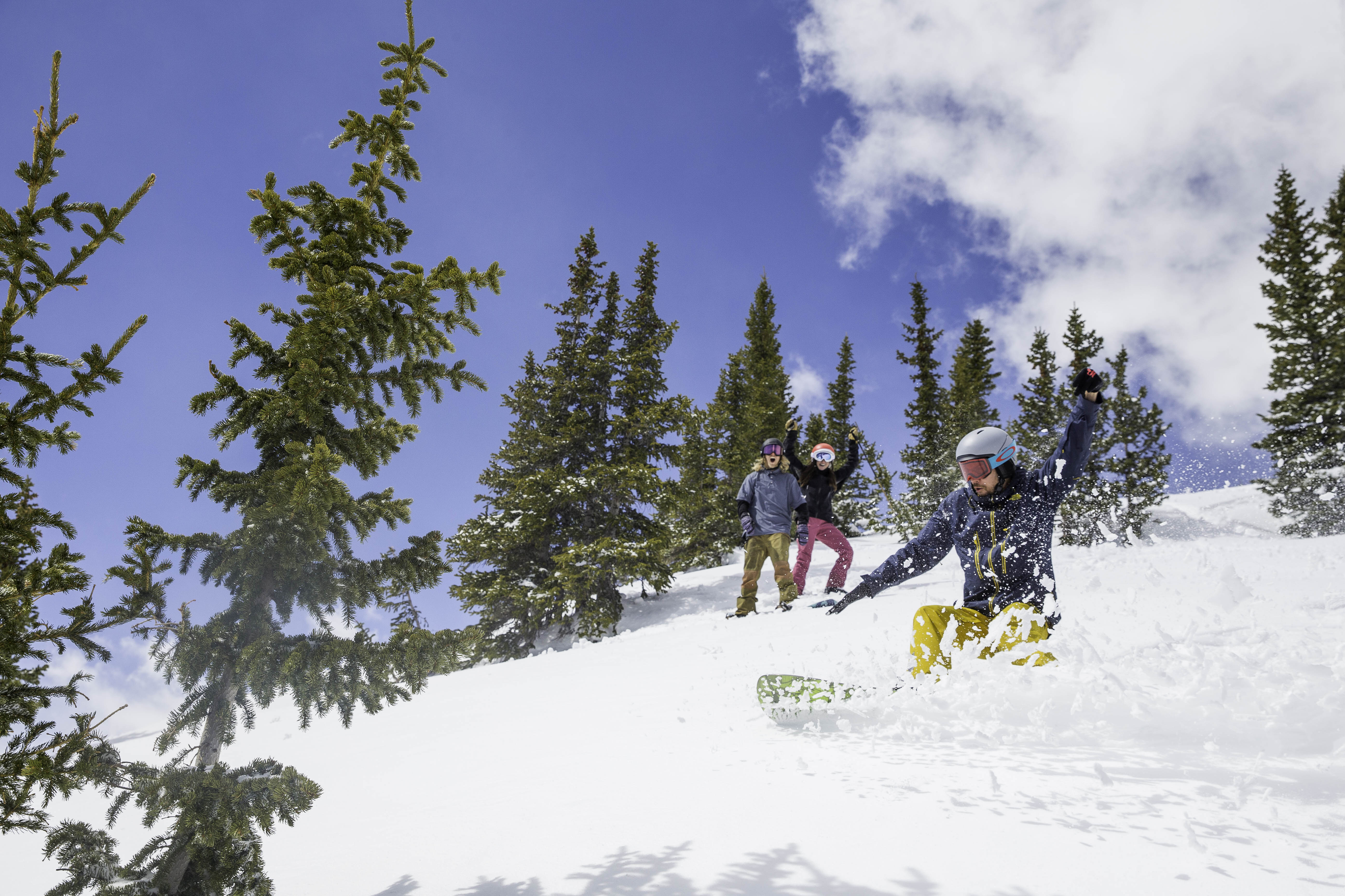 Friends Slashing Powder at Peak 10 in Breckenridge, CO